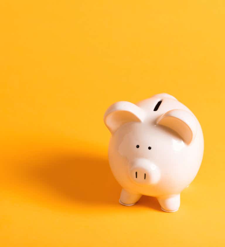 Piggy bank - yellow background